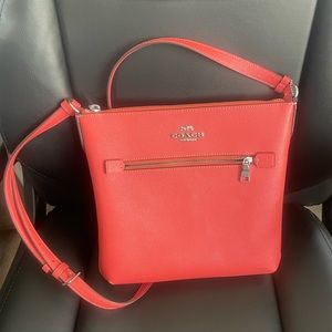 Coach crossbody coral/tangerine color
